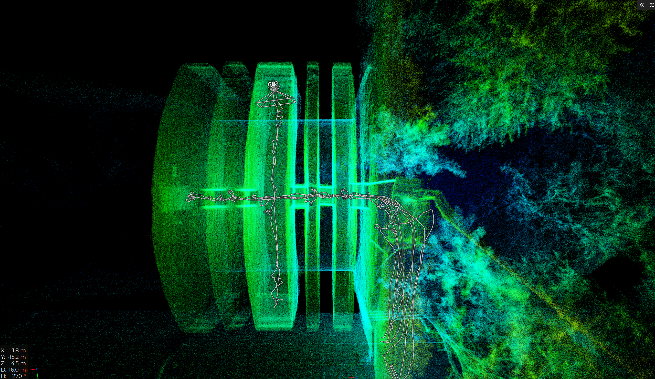 Looking down onto a LiDAR point cloud of a bridge inspection, where the path of an Elios 3 drone shows white lines moving around the bridge's substructure